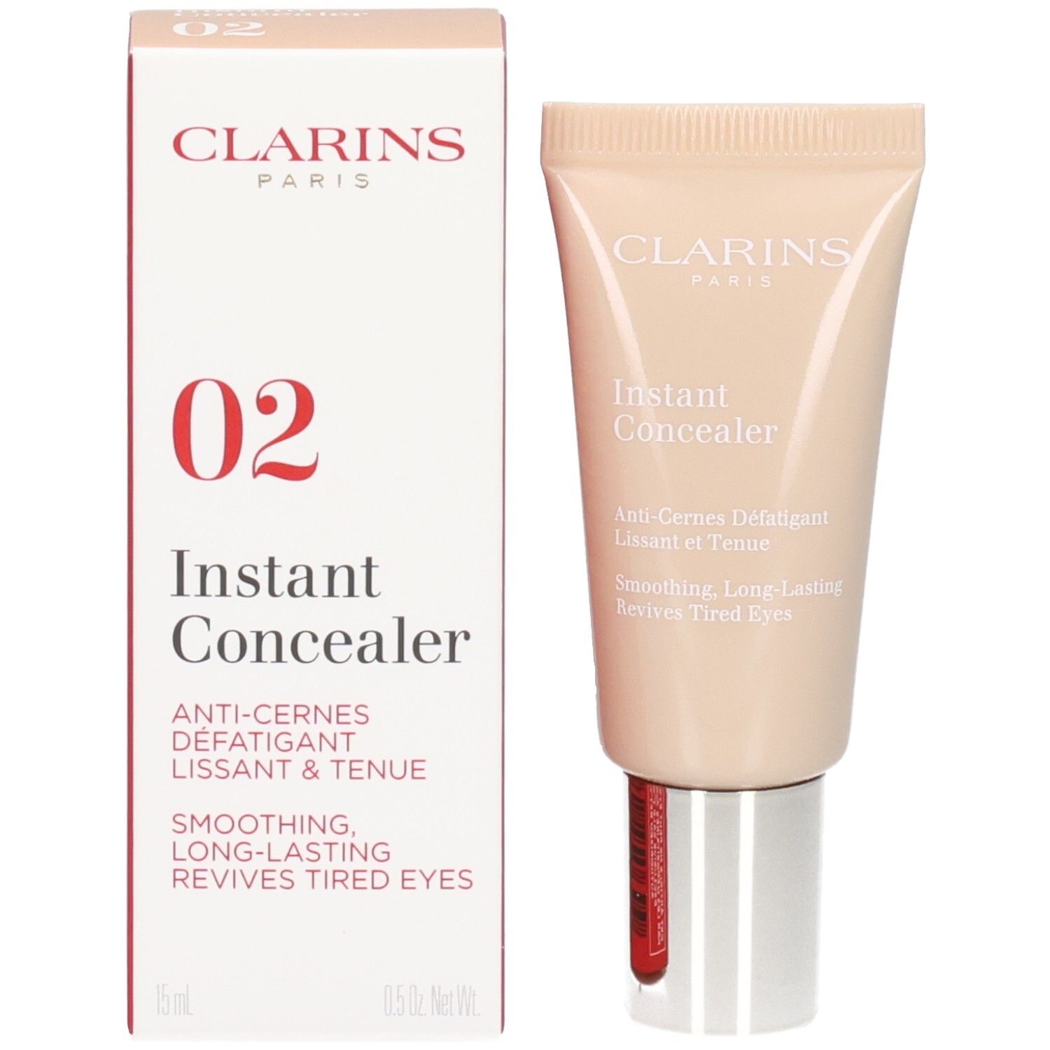 Clarins Instant Concealer, N°02, et son emballage. Le correcteur est dans un tube beige clair, la boîte est rouge et blanche.