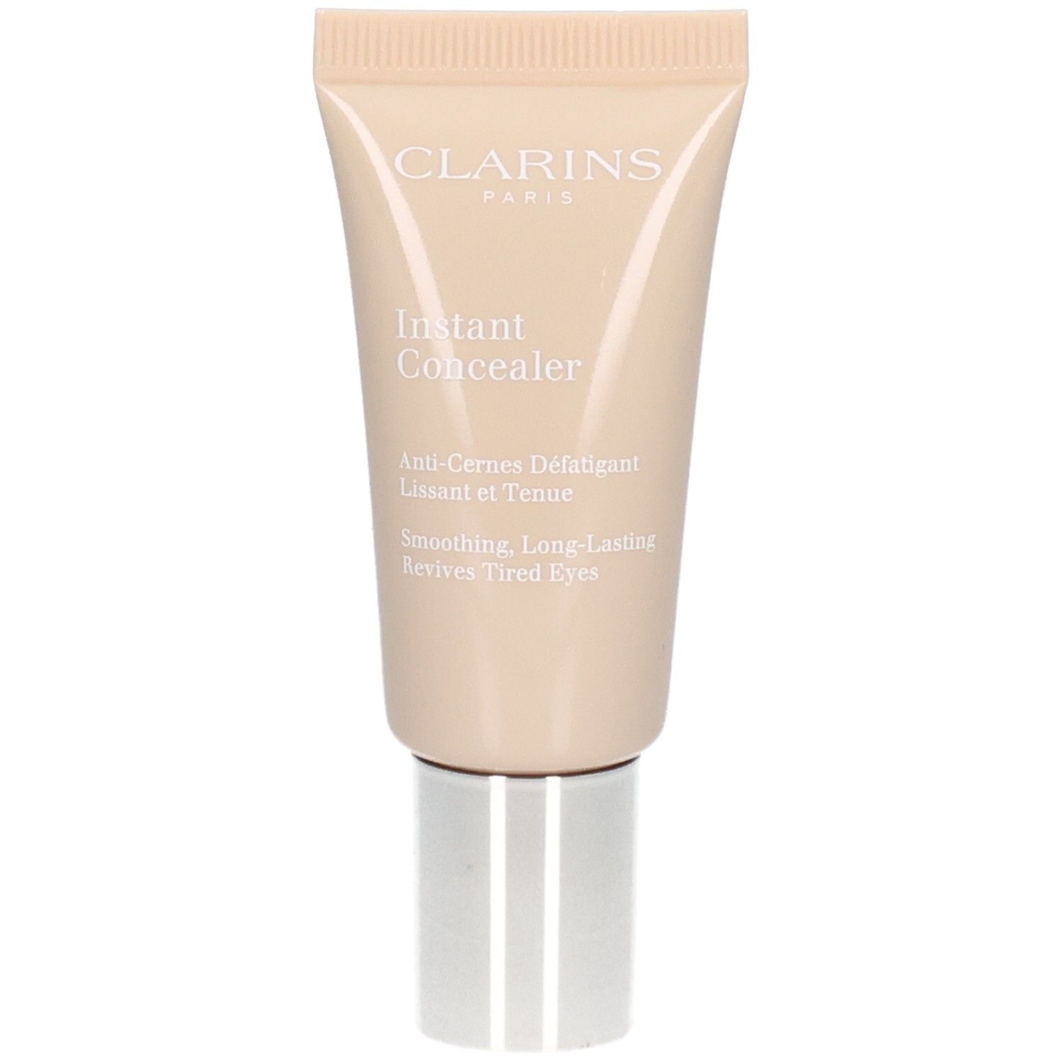 Tube Clarins Instant Concealer 03 avec bouchon à vis argenté. Couleur beige.