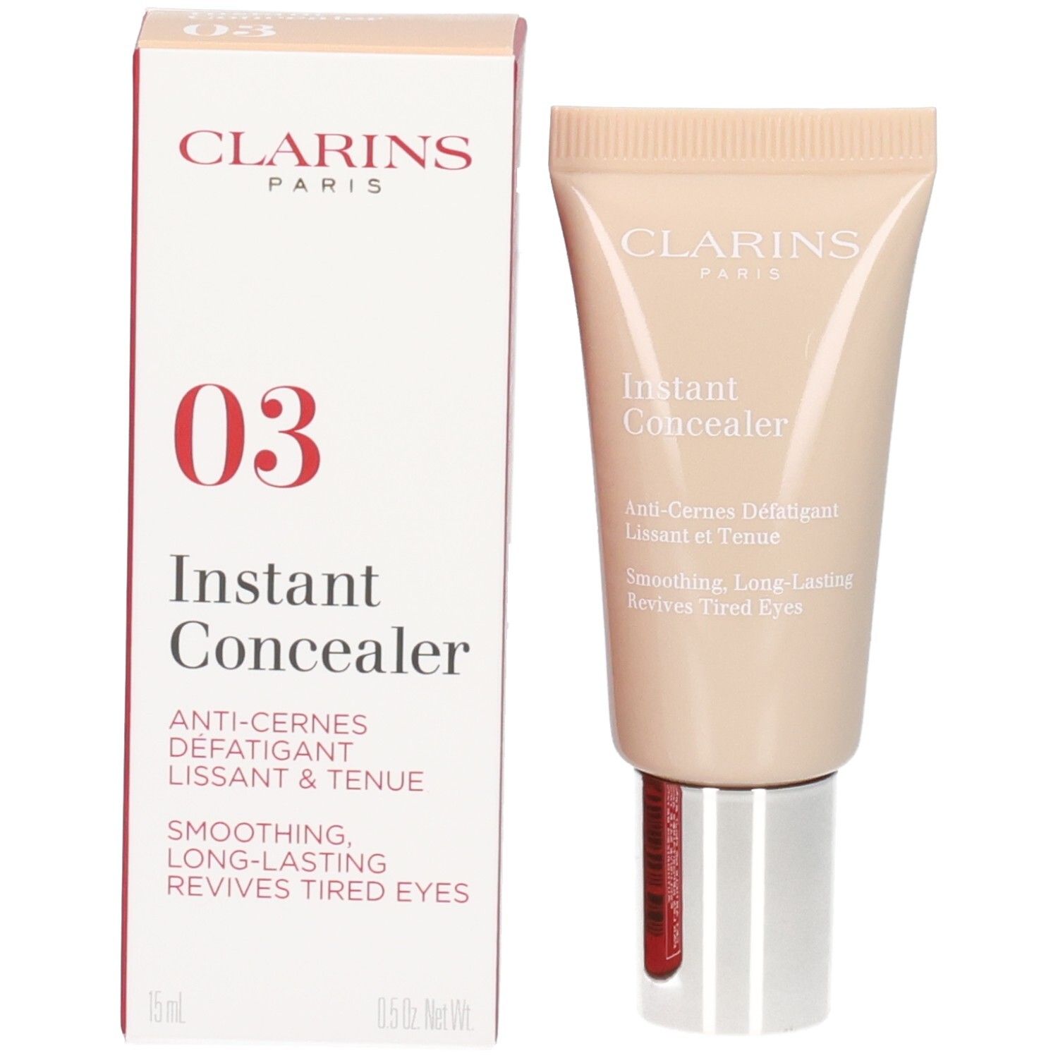 Tube et boîte Clarins Instant Concealer 03. Boîte avec design rouge et blanc et le numéro 03.