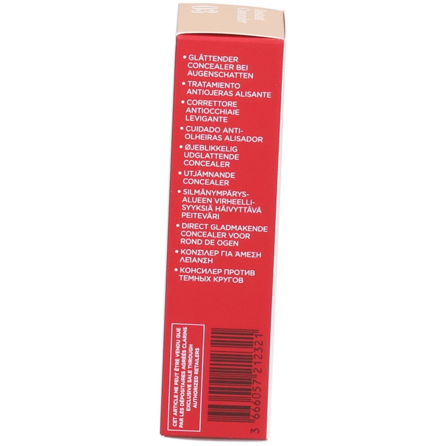 Côté de la boîte Clarins Instant Concealer 03 avec les avantages du produit et un code-barres.