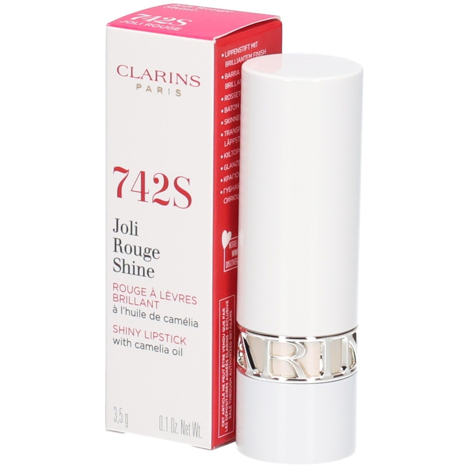 Rouge à lèvres Joli Rouge Shine 742S de Clarins dans un tube blanc avec anneau argenté, à côté de sa boîte.