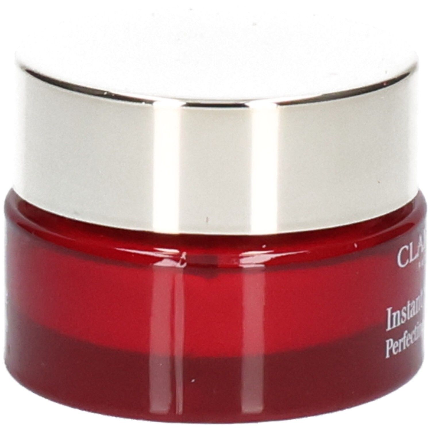 Pot Clarins Instant Smooth Perfecting Touch, base en verre rouge, couvercle argenté.