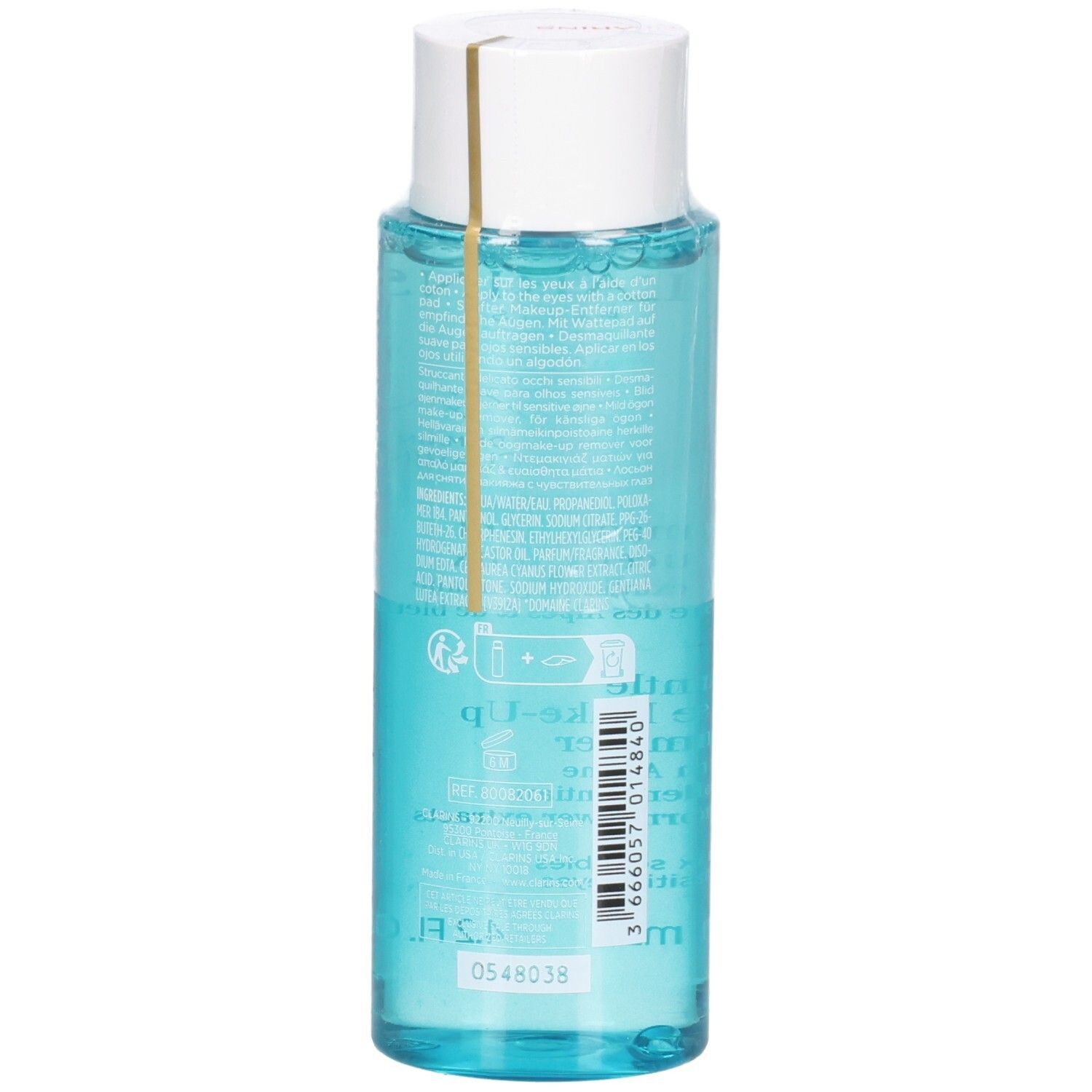 Démaquillant pour les yeux Clarins, arrière de la bouteille avec étiquette et code-barres, liquide bleu.