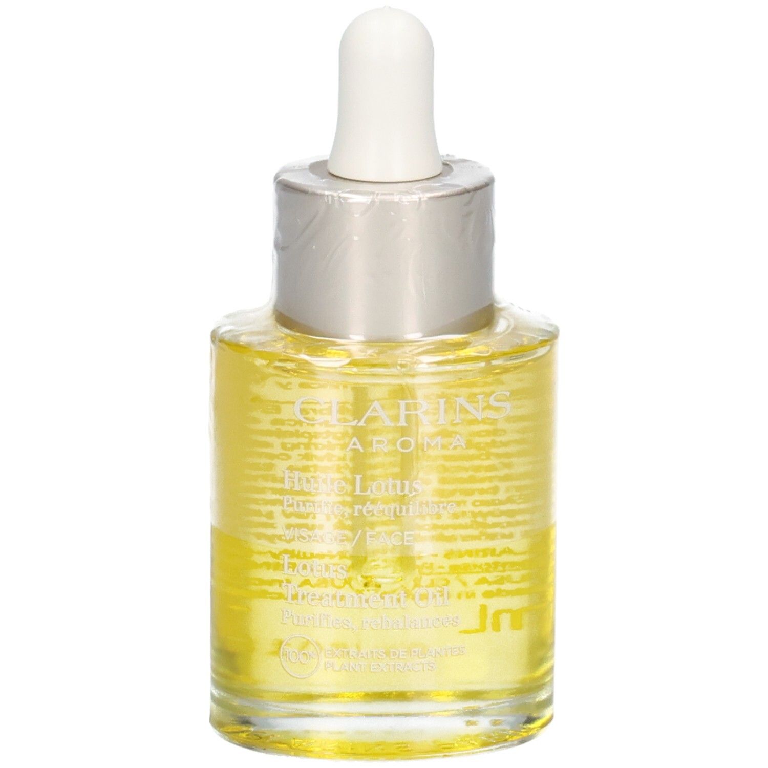 Huile Aroma Lotus Clarins dans un flacon en verre avec pipette. Liquide jaune.