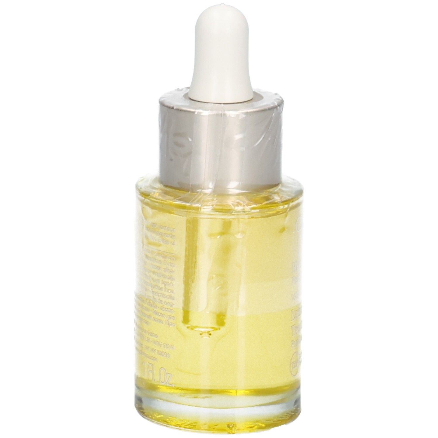 Huile Aroma Lotus Clarins, vue arrière. Liquide jaune dans un flacon en verre avec pipette.