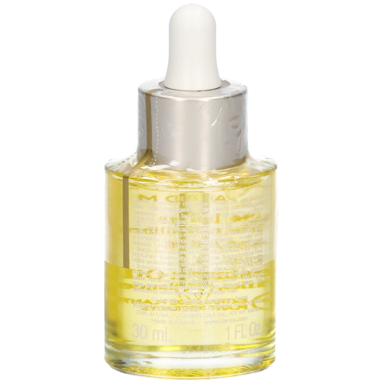 Huile Aroma Lotus Clarins, 30 ml. Liquide jaune dans un flacon en verre avec pipette.