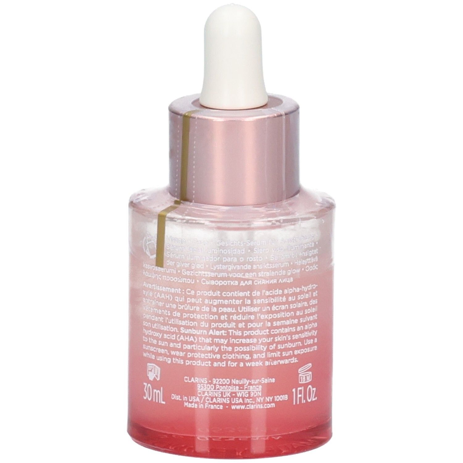 Flacon Clarins Multi Active Glow Serum avec pipette, verre teinté rose, vue arrière avec texte.