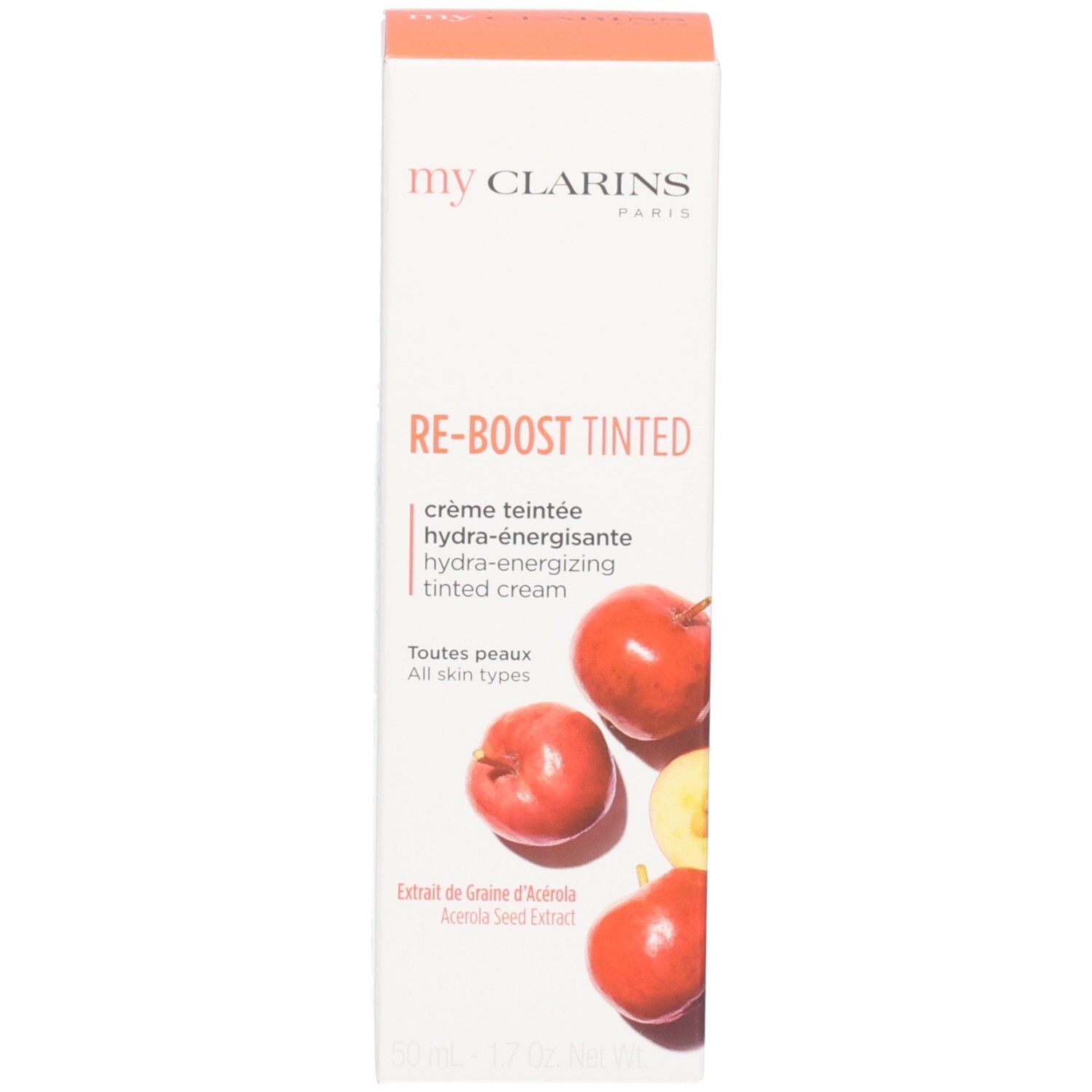 Boîte en carton avec des oranges et inscription "my CLARINS RE-BOOST TINTED".