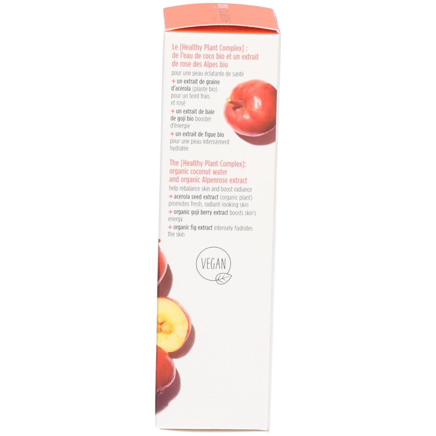 Côté d'une boîte en carton avec oranges, "Healthy Plant Complex" et sceau "VEGAN".