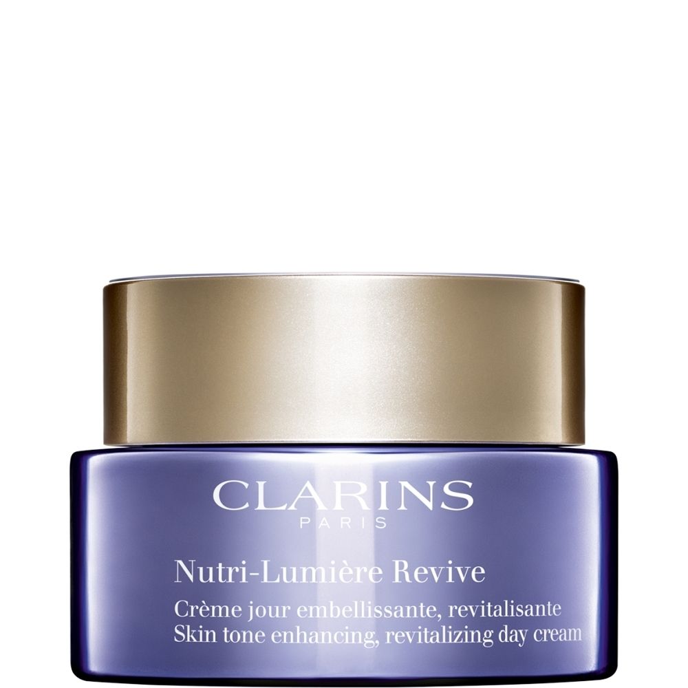 Crème de jour Clarins Nutri-Lumiere Revive dans un pot violet avec couvercle doré.