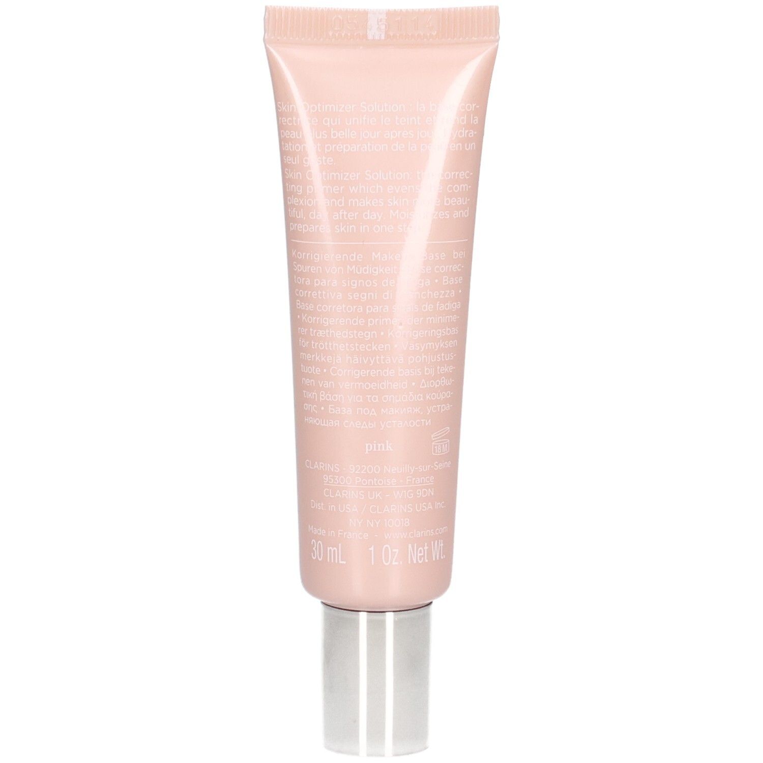 Arrière d'un tube rose contenant le SOS Primer Pink de Clarins, avec informations produit et 30 ml / 1 fl. Oz. Net Wt.
