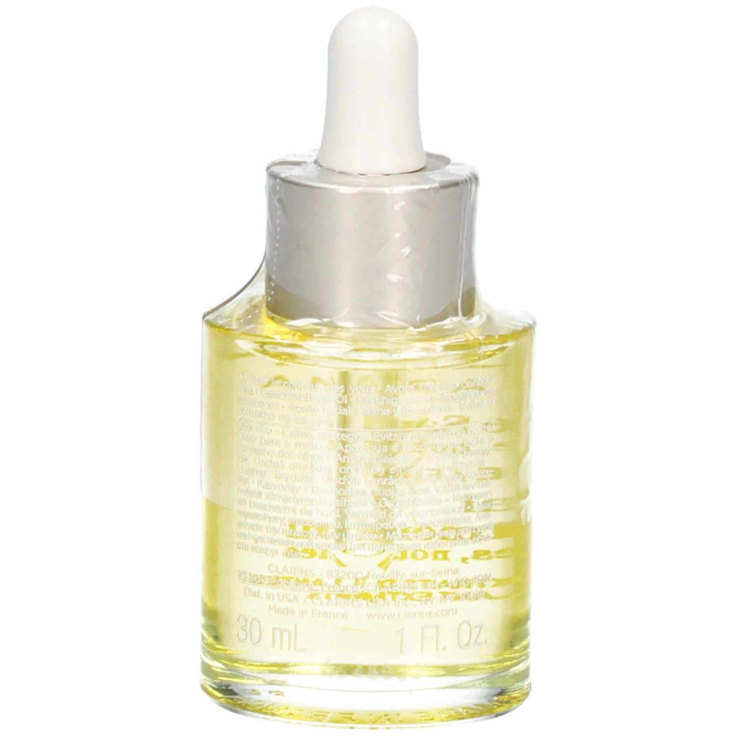 Flacon en verre avec pipette, rempli d'huile visage jaune. Étiquette indique 30 ml.