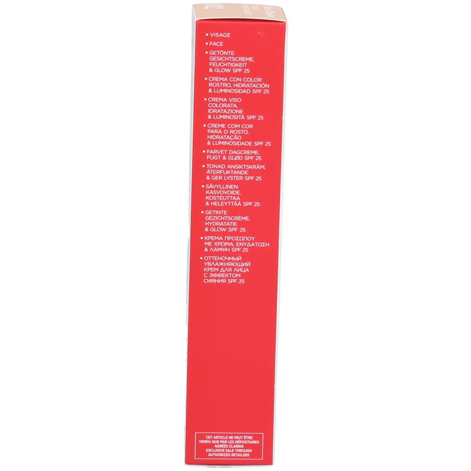 Vue latérale de la boîte Clarins Skin Illusion avec informations produit multilingues.
