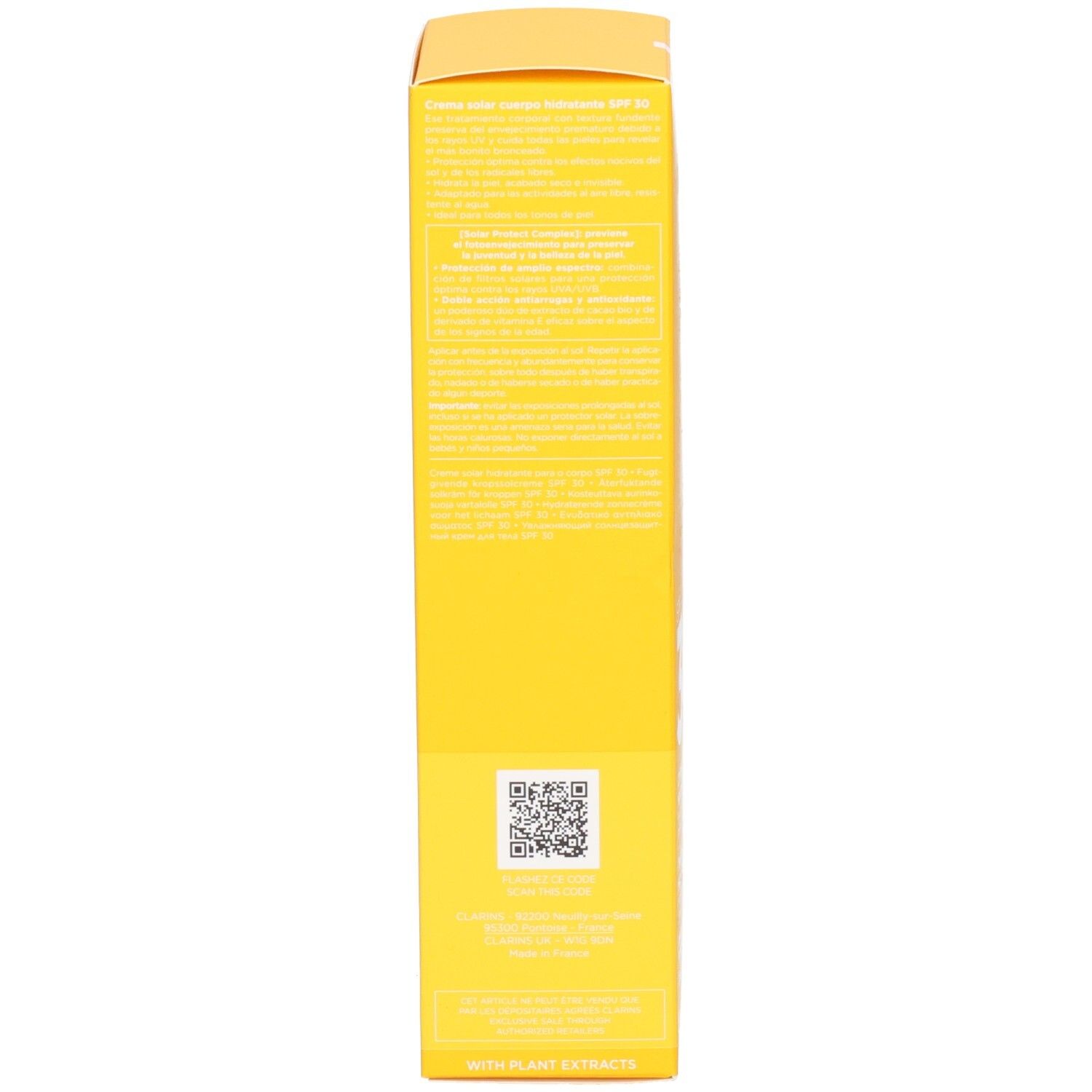 Côté de la boîte de crème solaire Clarins avec informations produit détaillées.