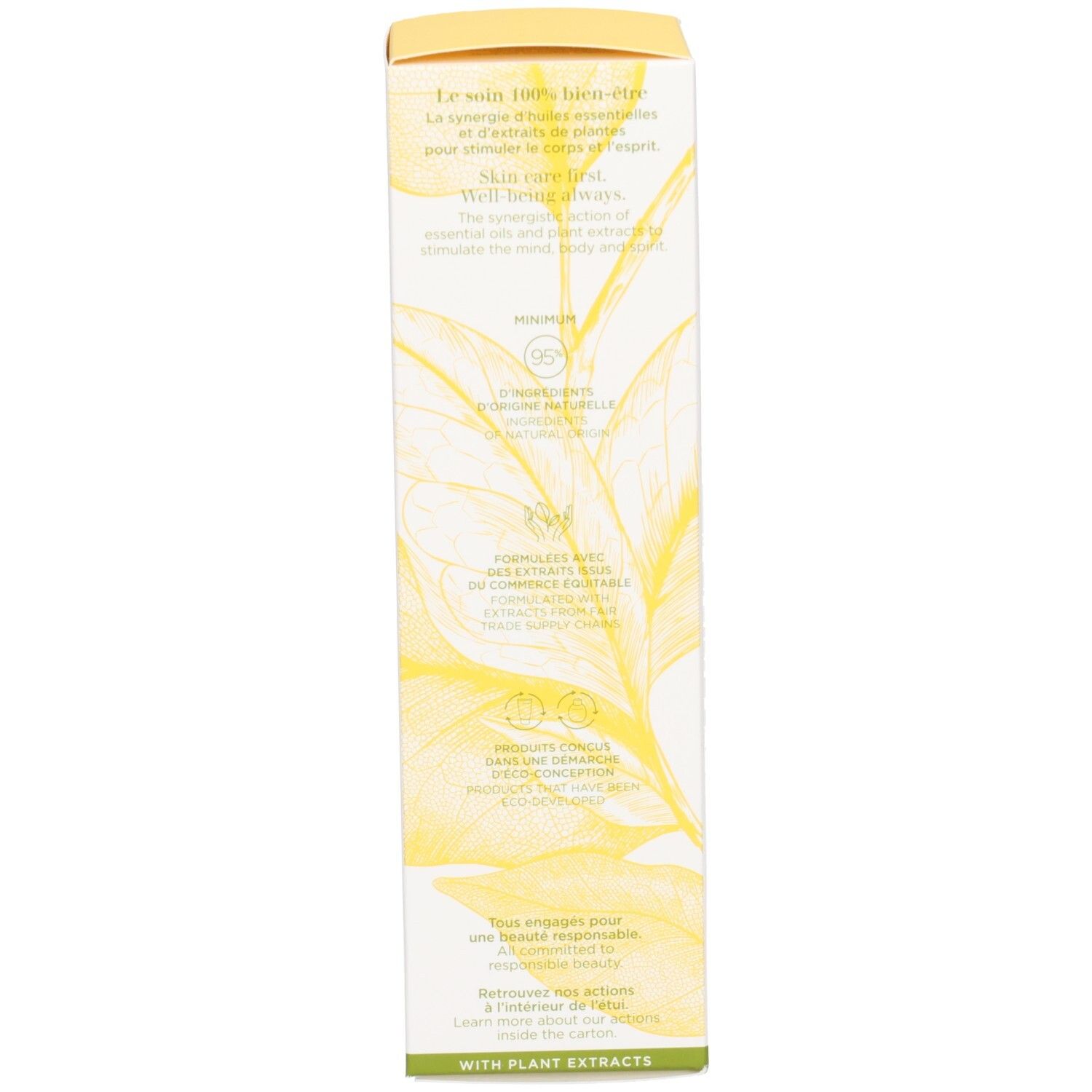 Côté de l'emballage Clarins Baume-Huile Hydratant "Tonic" avec motif de feuilles et texte.