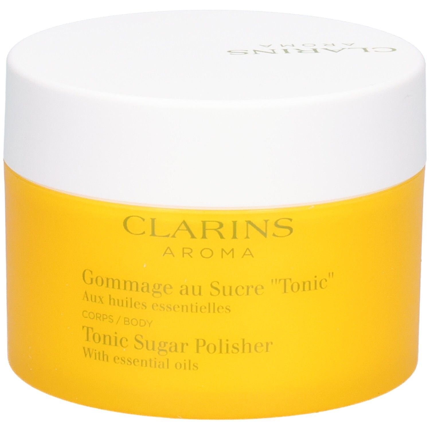 Clarins Gommage au Sucre Tonic dans un pot jaune avec couvercle blanc.