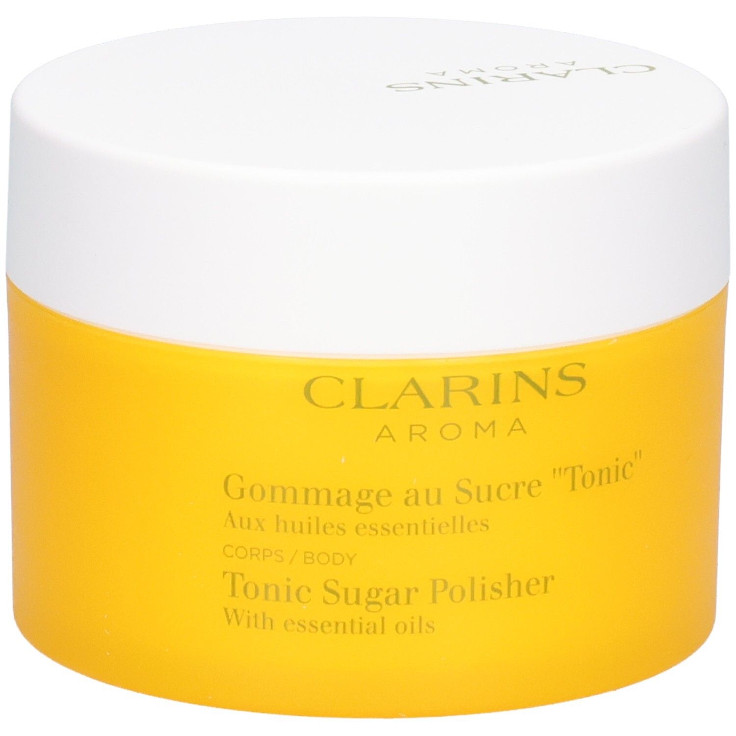 Clarins Gommage au Sucre Tonic dans un pot jaune avec couvercle blanc, vue légèrement en biais.