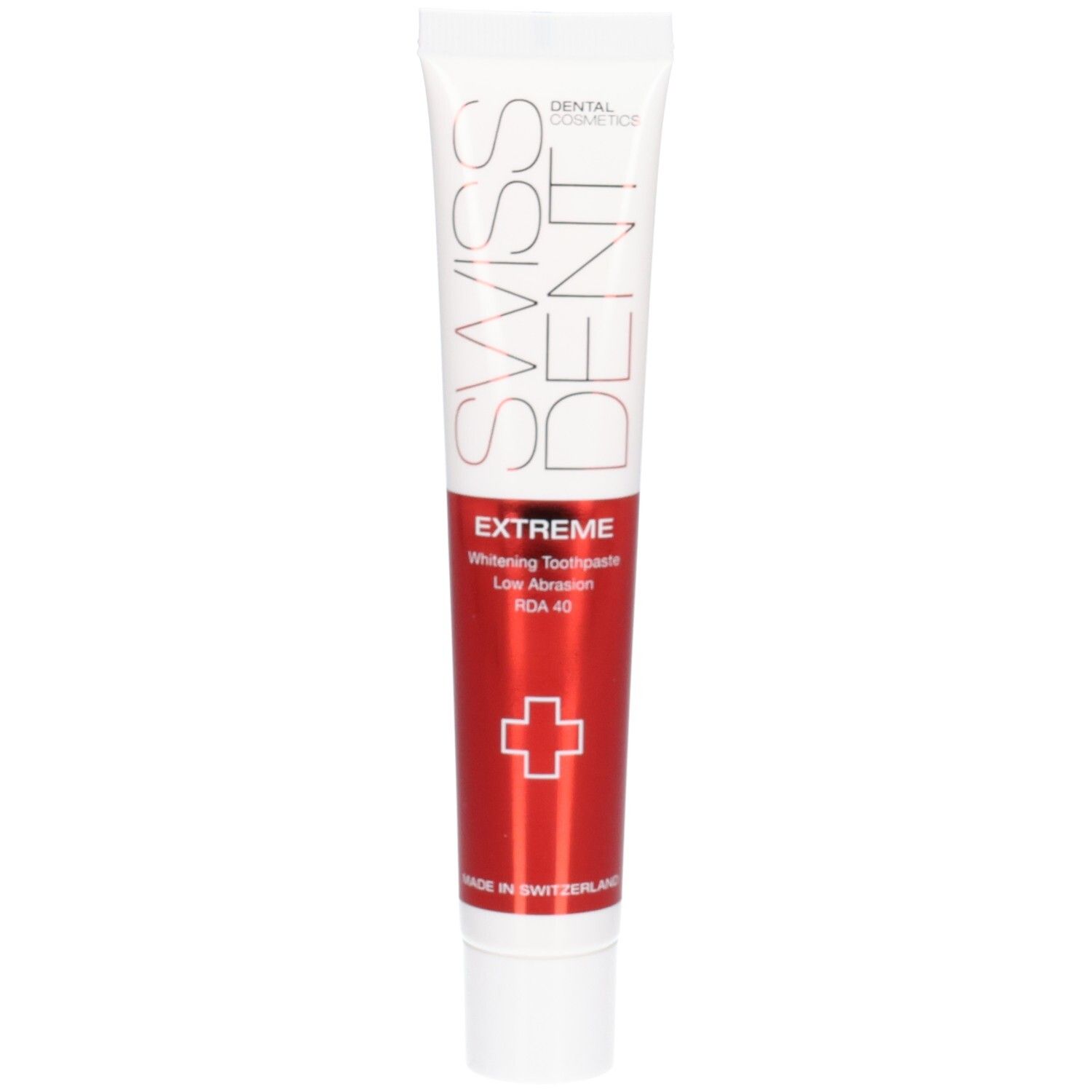 Tube de dentifrice avec bande rouge. Inscriptions: SWISSDENT, EXTREME, Whitening Toothpaste, RDA 40. Bouchon blanc.
