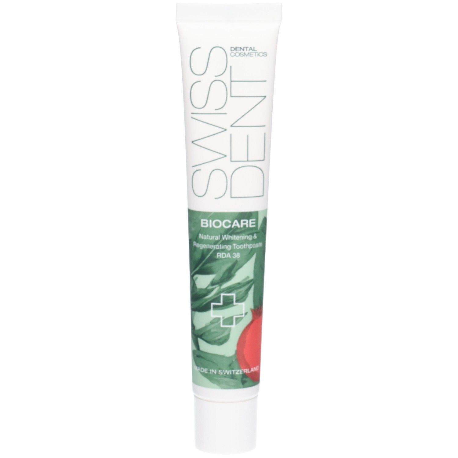 Tube de dentifrice SWISSDENT BIOCARE. Texte et illustration de grenade. Fond vert et blanc. Emballage vertical.