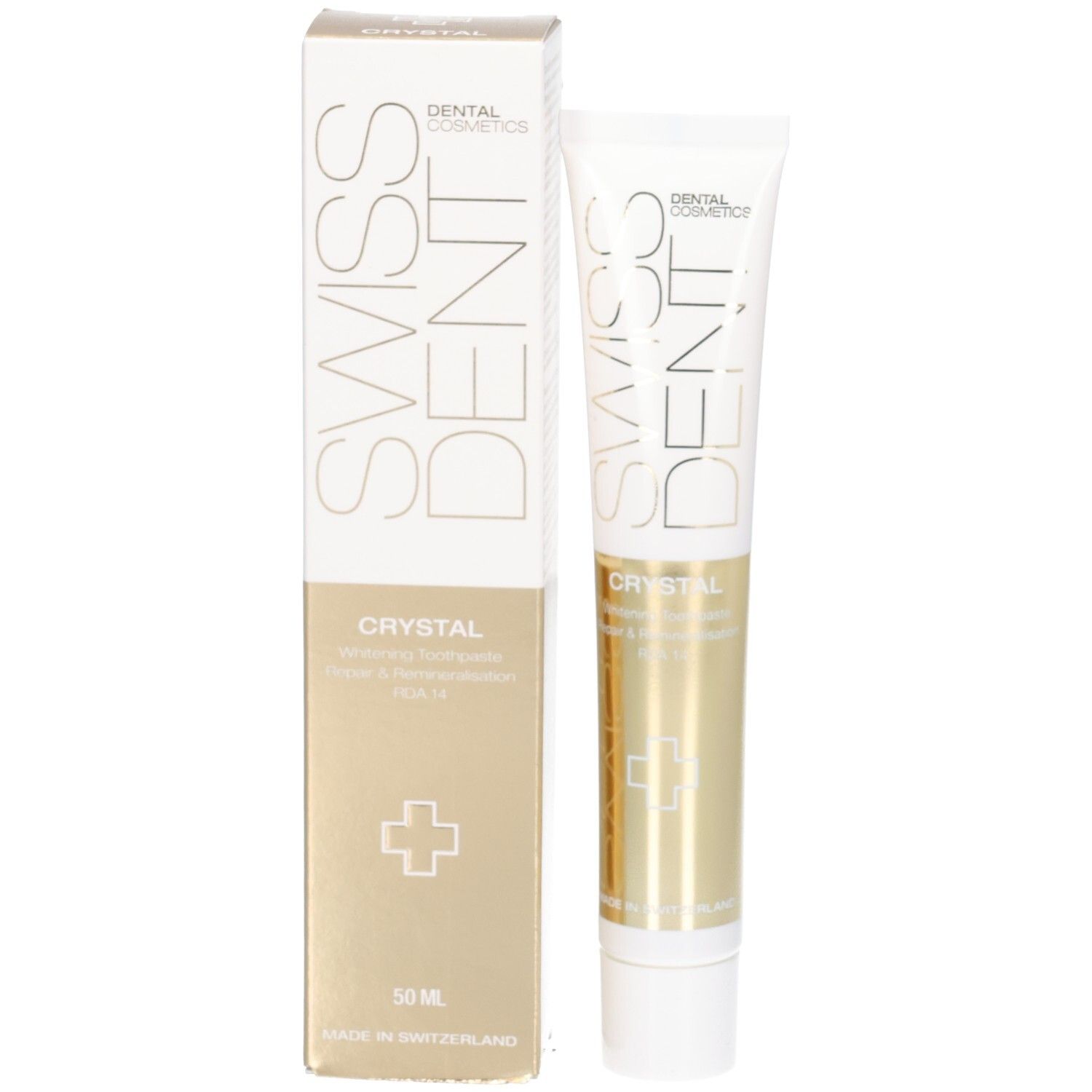 Tube et boîte de dentifrice. Inscription SWISSDENT CRYSTAL. Sections dorées. Croix blanche. 50 ml. Orientation verticale.