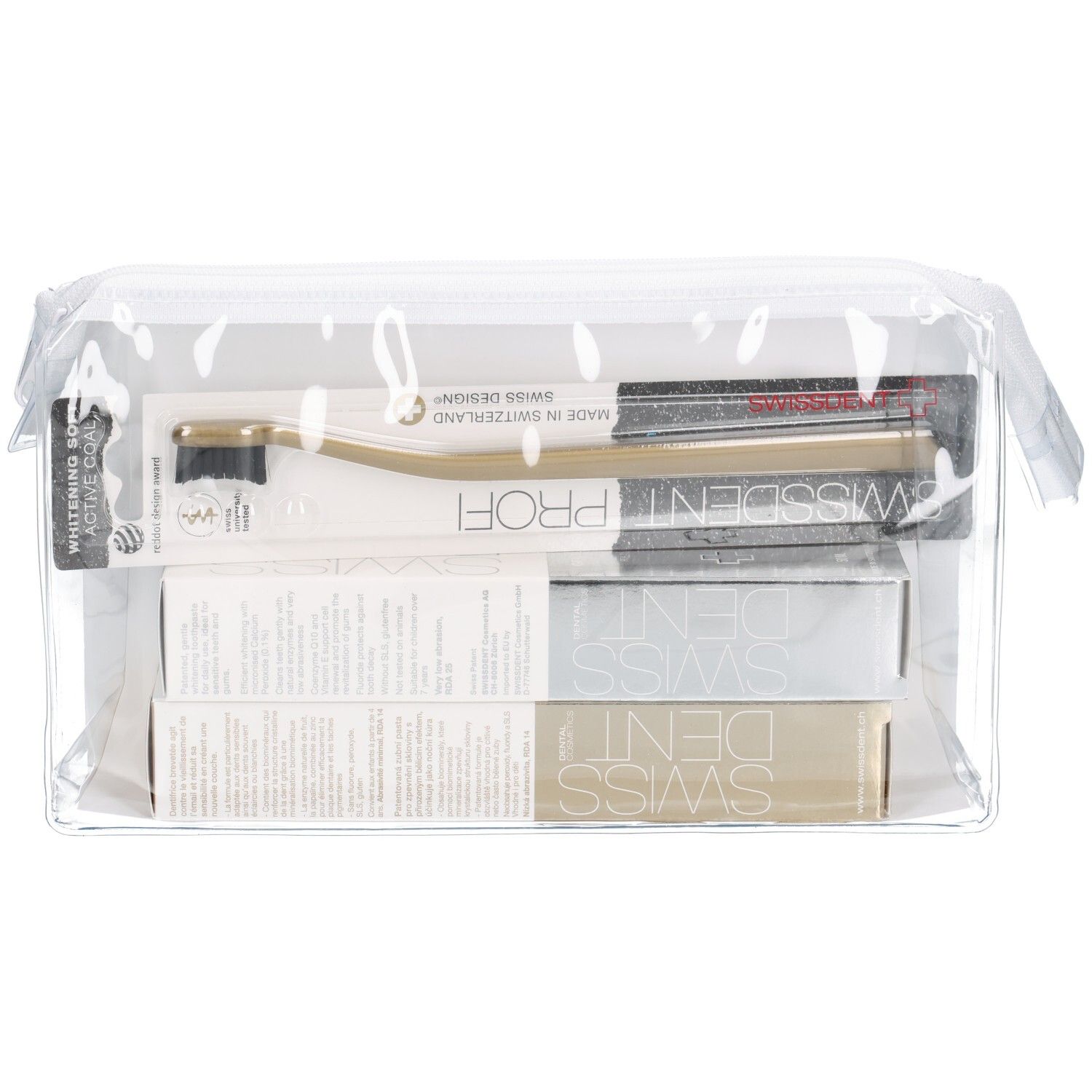 Trousse de toilette transparente avec brosse à dents, dentifrice et emballages SWISSDENT. Brosse dorée, étiquette blanche.