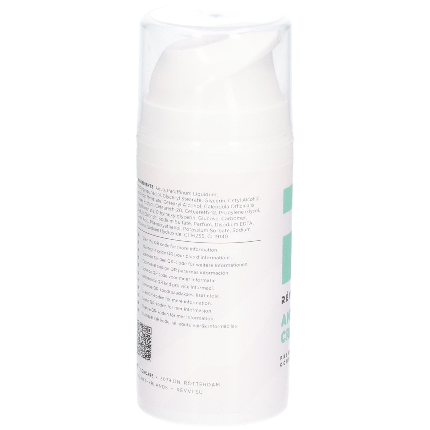 Dos du flacon blanc. Texte avec ingrédients et codes QR. Bouchon transparent. Marque RÉVVI.