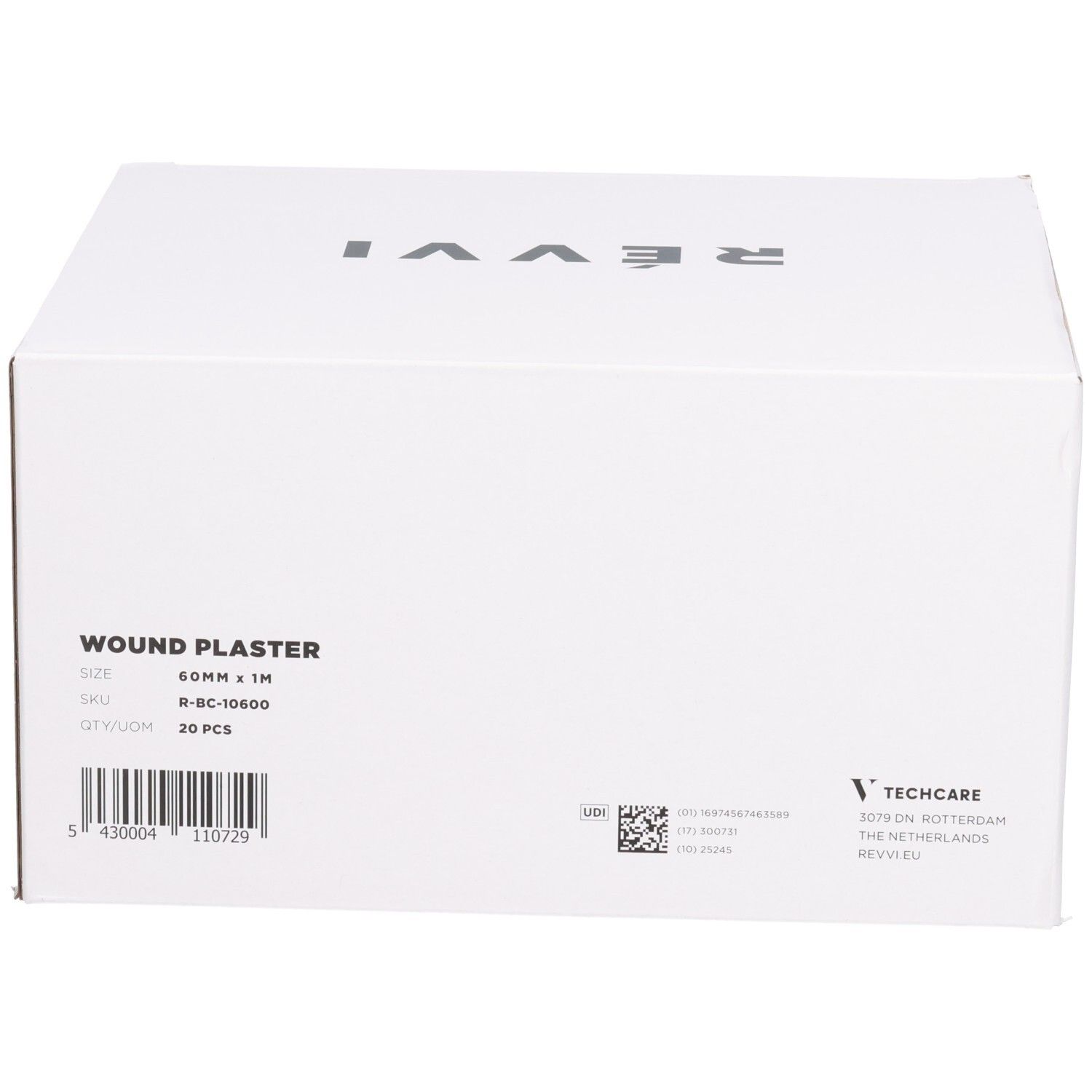 Boîte blanche avec l'inscription WOUND PLASTER, 20 pièces, 60mm x 1M. Sur le côté: Techcare, RÉVVI EU.