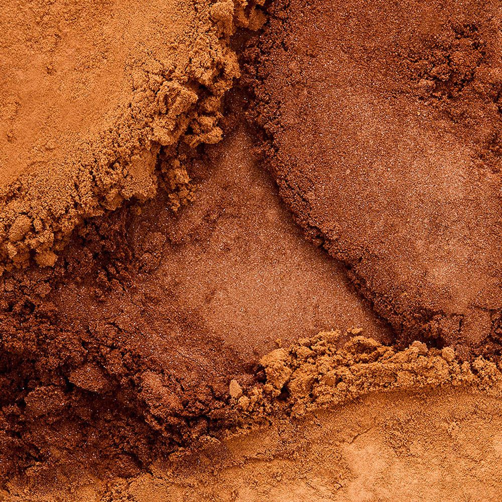 Gros plan de la texture de Collistar Magica Poudre Bronzante.