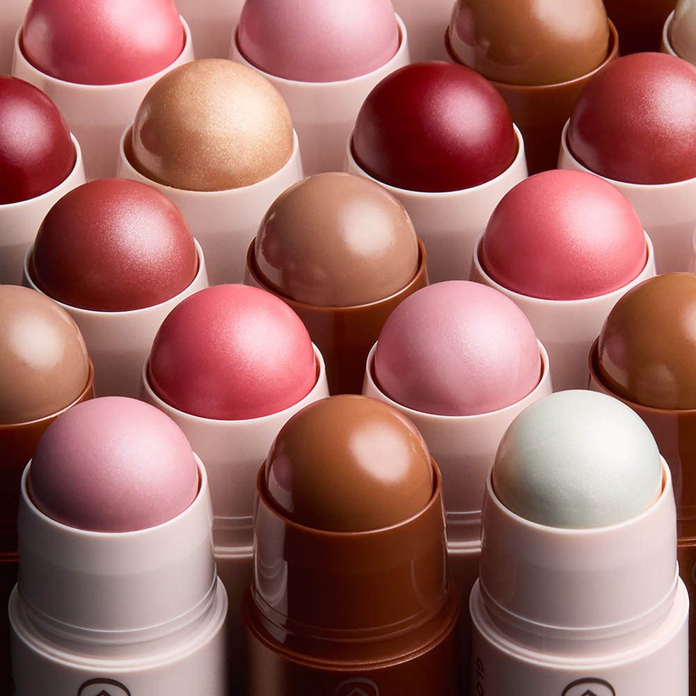 Collistar Twist Velvet Contour Stick, couleur bronze, sur fond violet foncé.