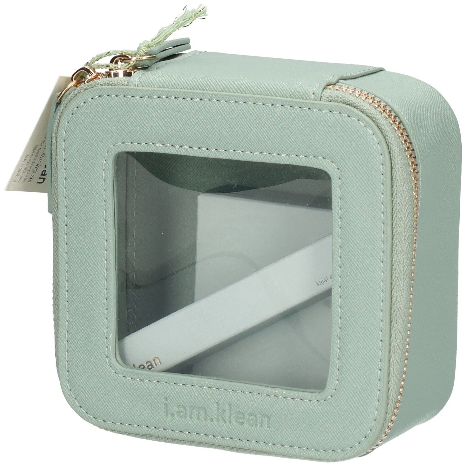 Trousse de toilette verte avec fenêtre transparente et fermeture éclair. Contient un produit blanc.