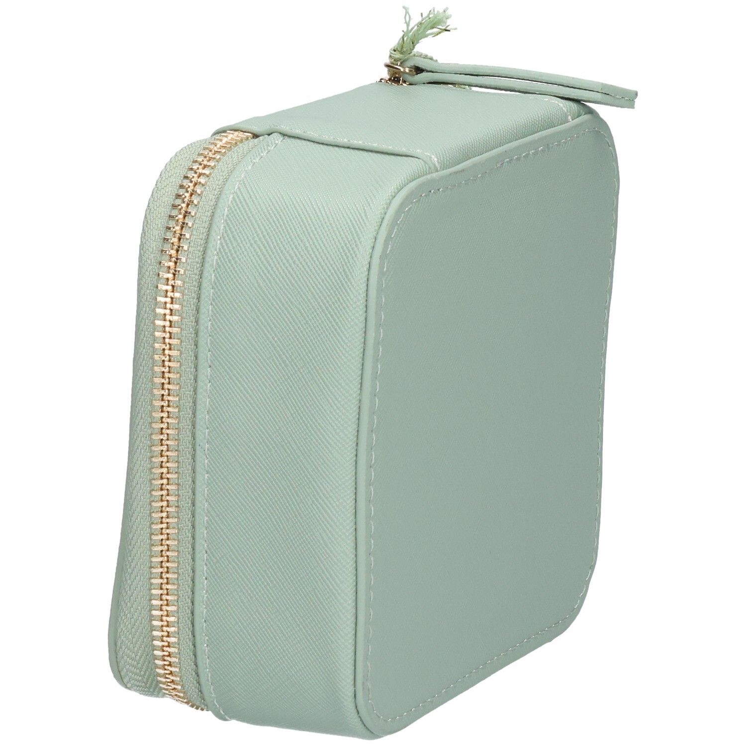 Vue latérale d'une trousse de toilette verte avec fermeture éclair. Contient un produit blanc.