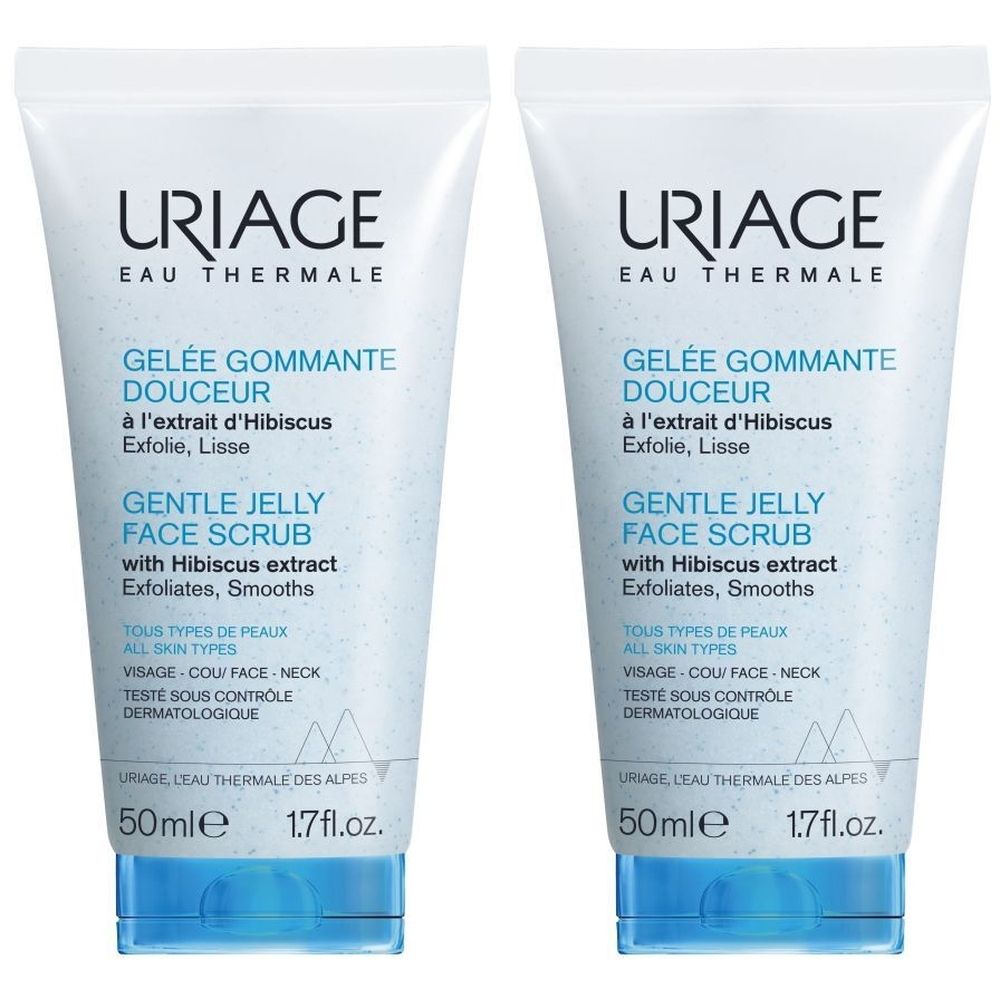 Deux tubes de Uriage Gelée Gommante Douceur. Tubes bleu clair avec texte bleu et bouchon bleu. Texte: Gentle Jelly Face Scrub.
