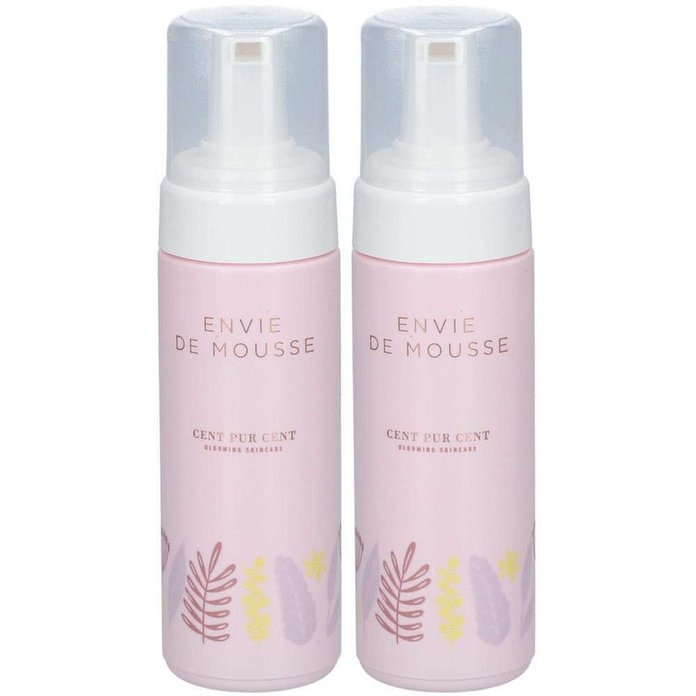 Deux flacons roses avec pompe blanche. Inscription : Envie de Mousse, Cent Pur Cent. Motifs de feuilles.