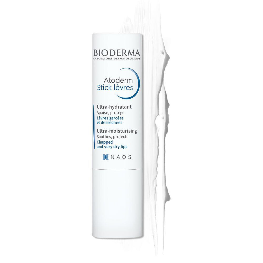 Stick à lèvres blanc avec trace de produit blanc. Inscription: Bioderma, Atoderm Stick lèvres, Ultra-hydratant, Apaise, protège.