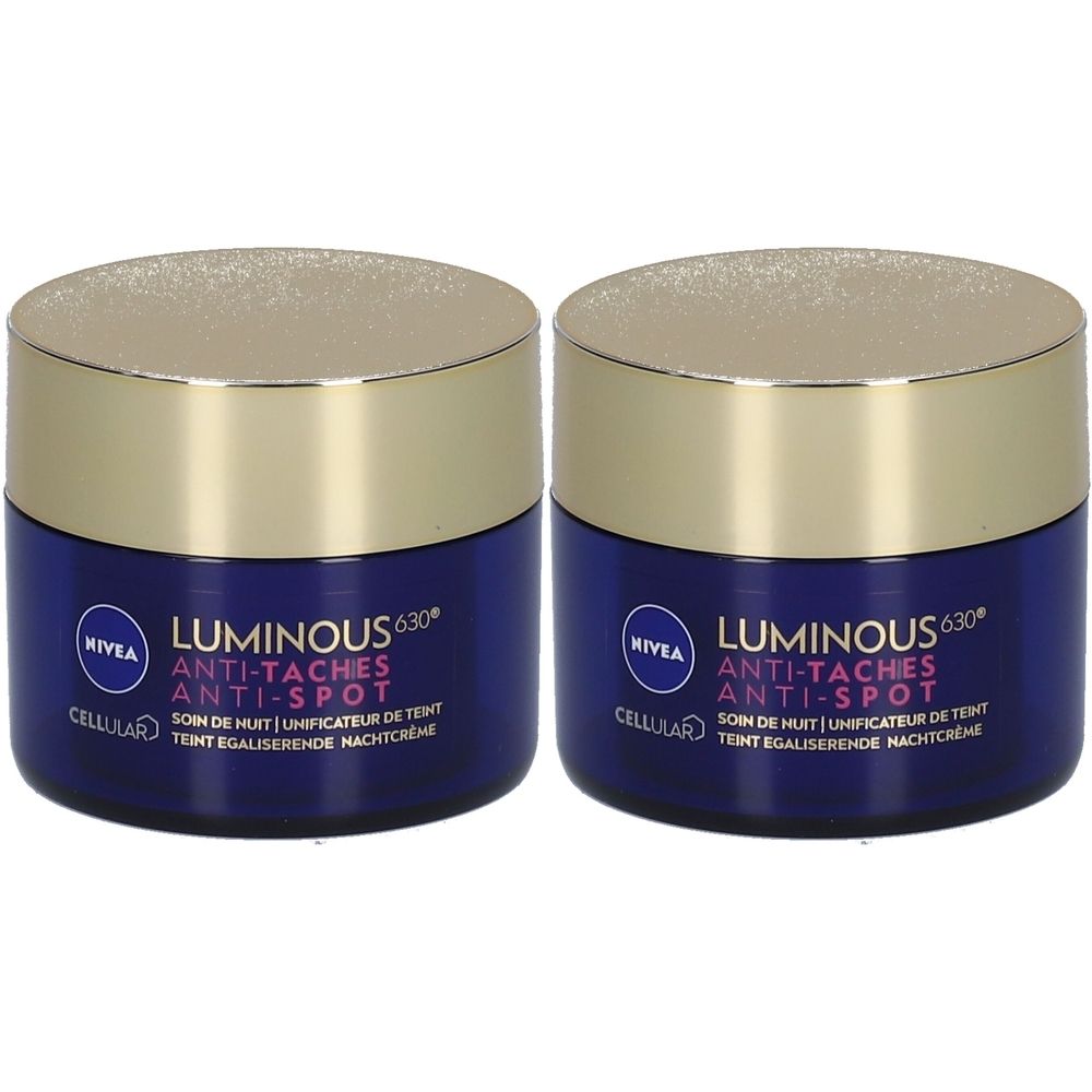 Deux pots bleus avec couvercles dorés. Inscription: NIVEA LUMINOUS630 Anti-Taches Anti-Spot. Crème de nuit.