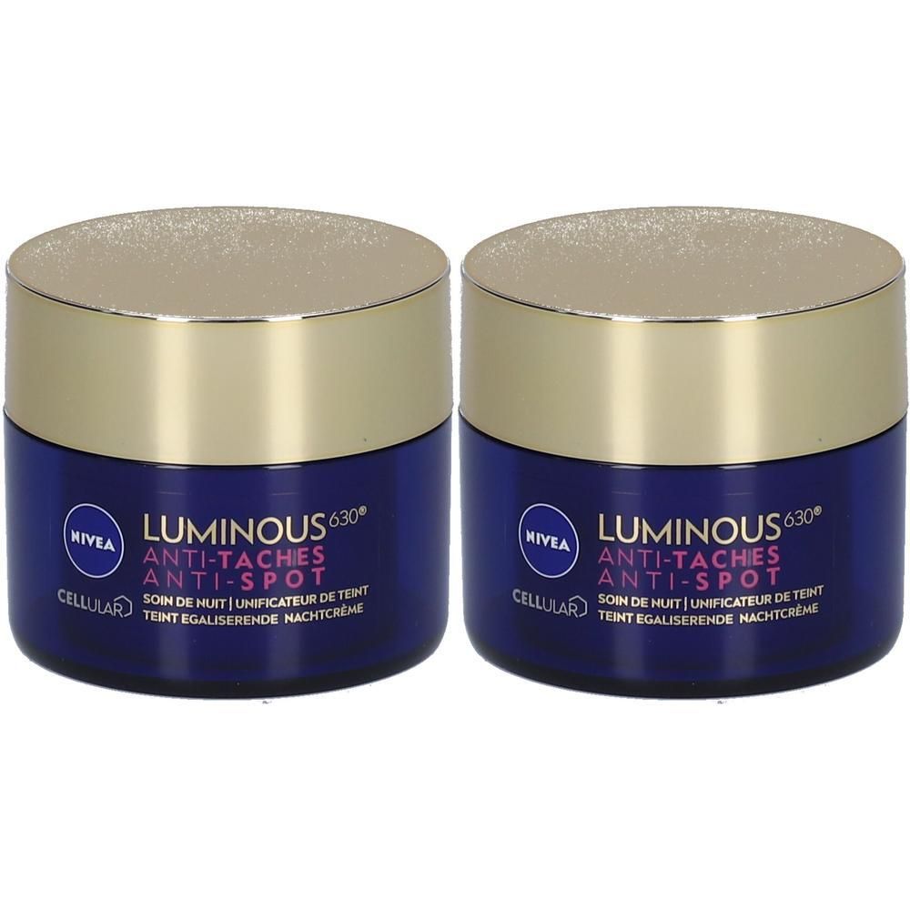 Deux pots bleus avec couvercles dorés. Inscription: NIVEA LUMINOUS630 Anti-Taches Anti-Spot. Crème de nuit.