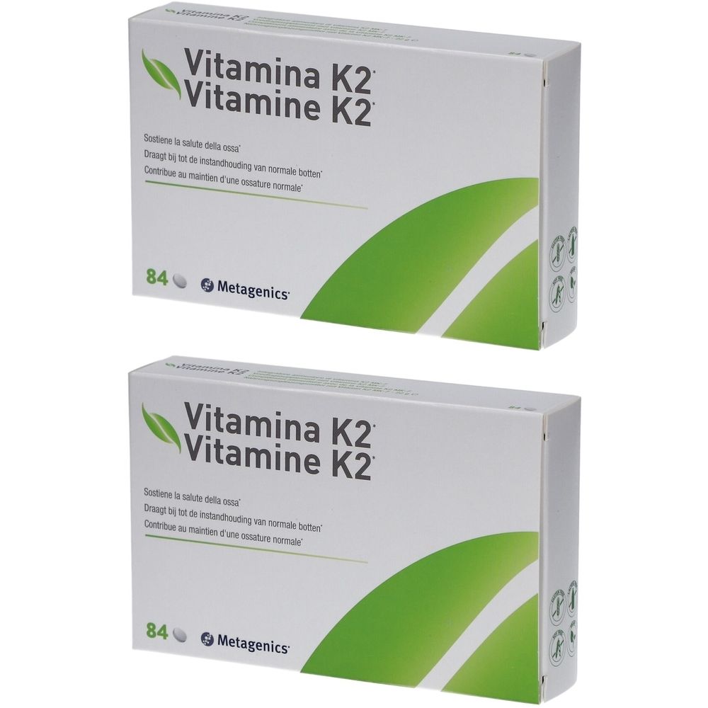 Deux boîtes de Metagenics Vitamine K2. Emballage blanc avec accents verts et informations produit.