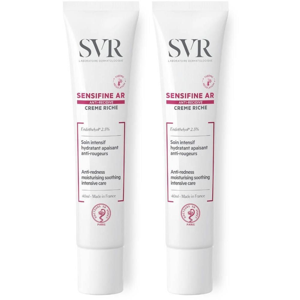 Deux tubes de SVR Sensifine AR Crème Riche. Blanc, avec texte rose et noir. Inscriptions françaises.