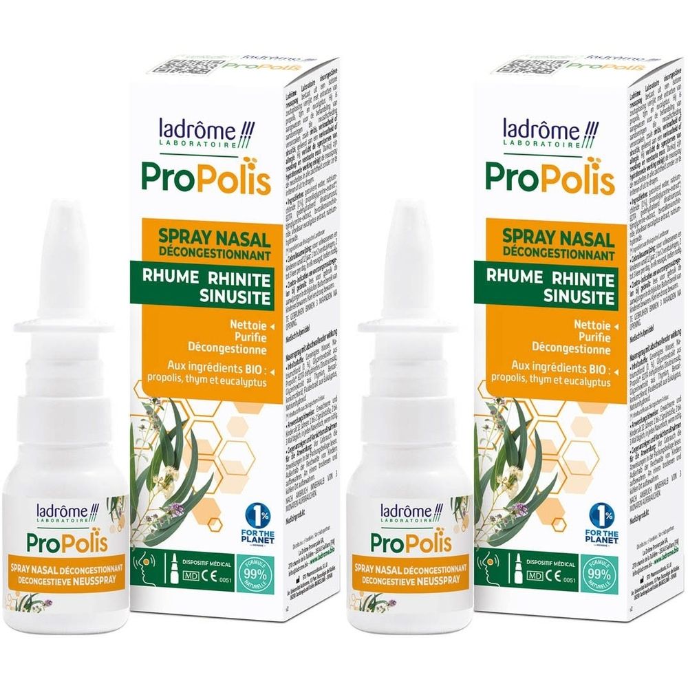 Spray nasal et emballage. Flacon blanc avec embout, emballage jaune avec nom et ingrédients du produit.