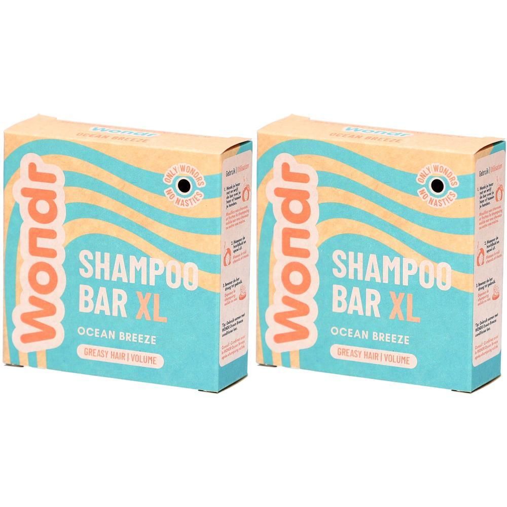 Deux boîtes rectangulaires. Inscription : Wondr, Shampoo Bar XL Ocean Breeze. Tons turquoise, orange et beige.