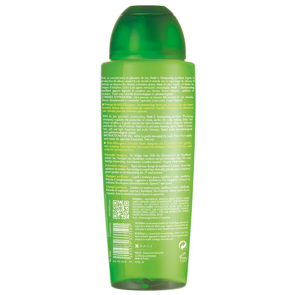 Flacon vert, dos. BIODERMA Nodé G Shampooing Purifiant. Texte et code QR sur l'étiquette.