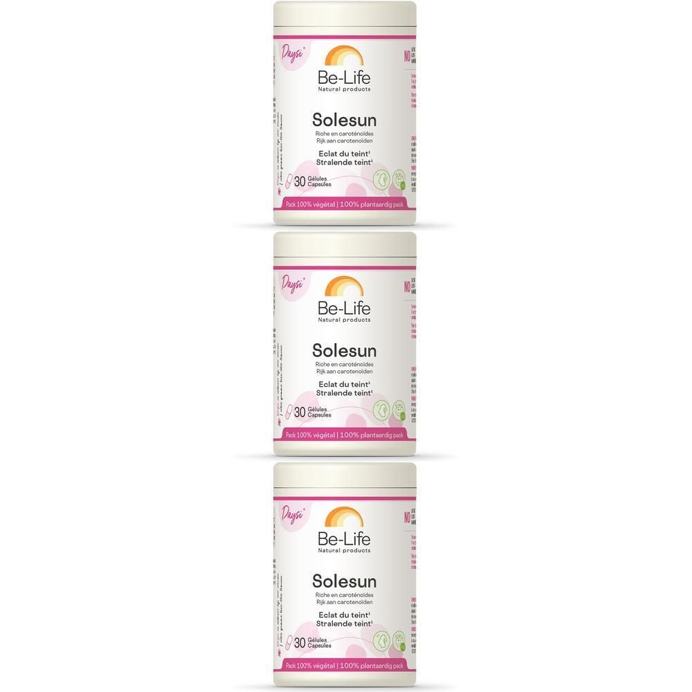 Trois boîtes de Solesun Be-Life. Récipients blancs avec étiquettes roses. Texte: Solesun, 30 gélules, 100% vegan.