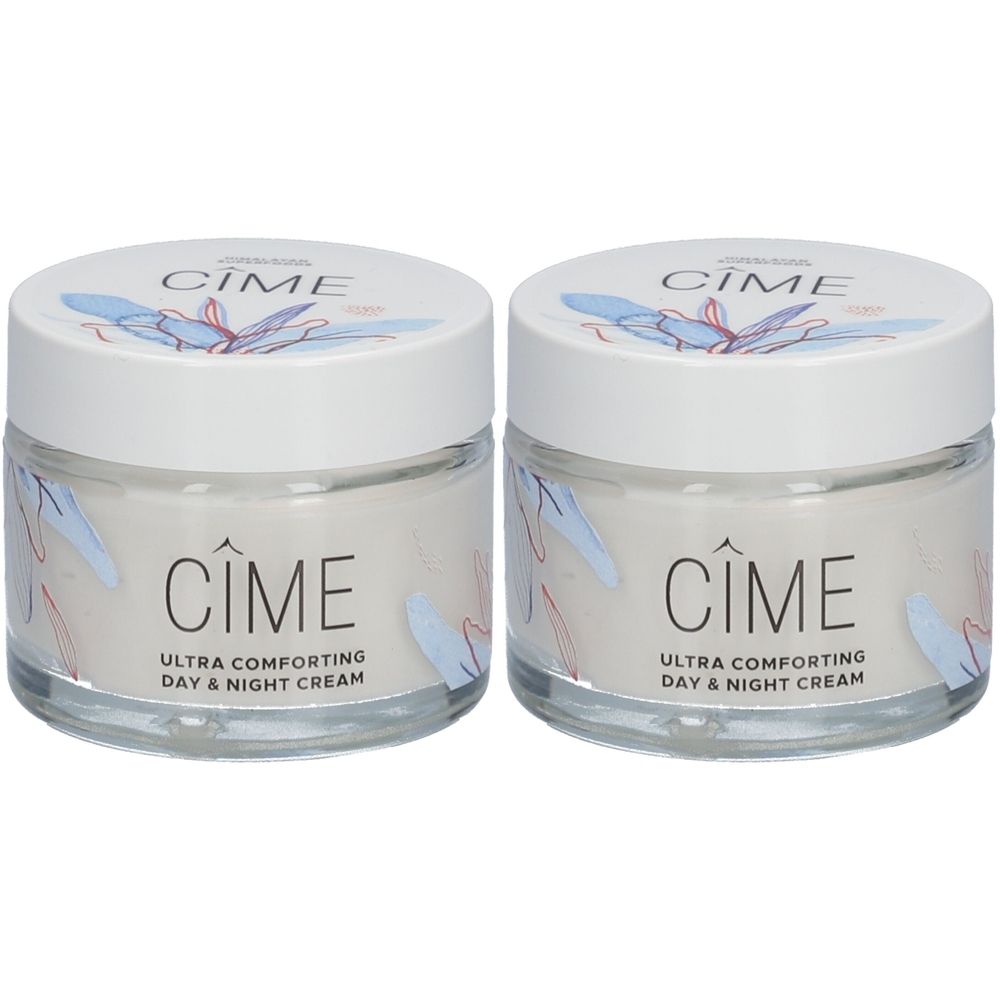 Deux pots de crème avec couvercles blancs. Inscription : Cîme, Ultra Comforting Day & Night Cream. Pots en verre.