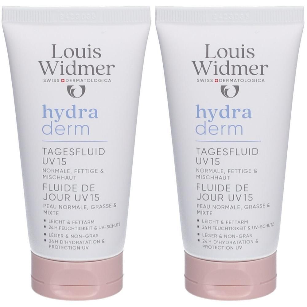 Deux tubes de Louis Widmer Hydraderm Fluide de Jour UV15. Tubes blancs avec bouchon rose. Inscriptions en allemand et français.