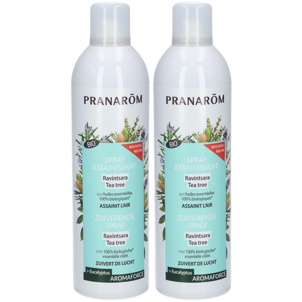 Deux flacons spray blancs avec étiquettes. Inscription: PRANARÔM, Spray assainissant, Ravintsara Tea tree, BIO.