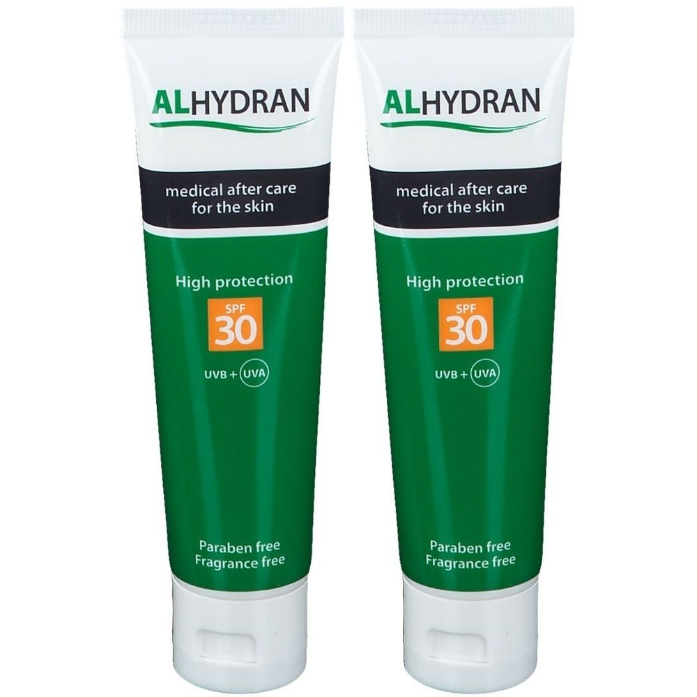 Deux tubes de Alhydran Crème Solaire SPF30. Emballage blanc et vert. Texte: medical after care for the skin, High protection, SPF 30, Paraben free, Fragrance free.