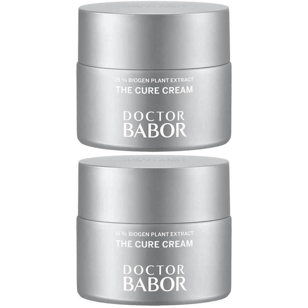 Deux pots argentés avec l'inscription THE CURE CREAM et DOCTOR BABOR.