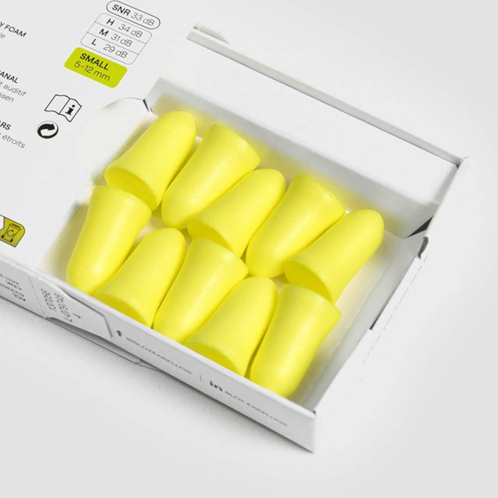 Deux bouchons d'oreilles en mousse blox® jaunes, petits, sur fond blanc.