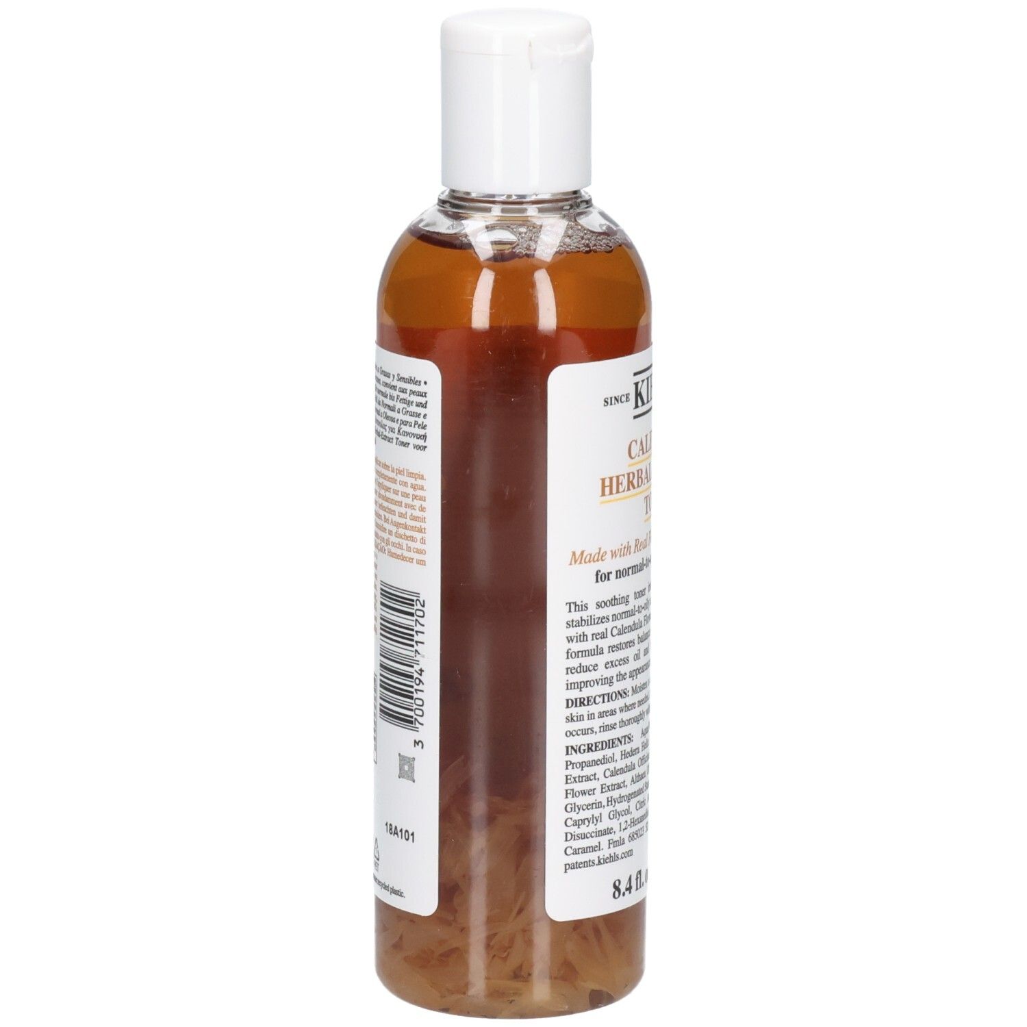 Vue arrière de la bouteille Kiehl's Calendula Herbal-Extract Toner. Étiquette avec ingrédients et instructions d'utilisation.