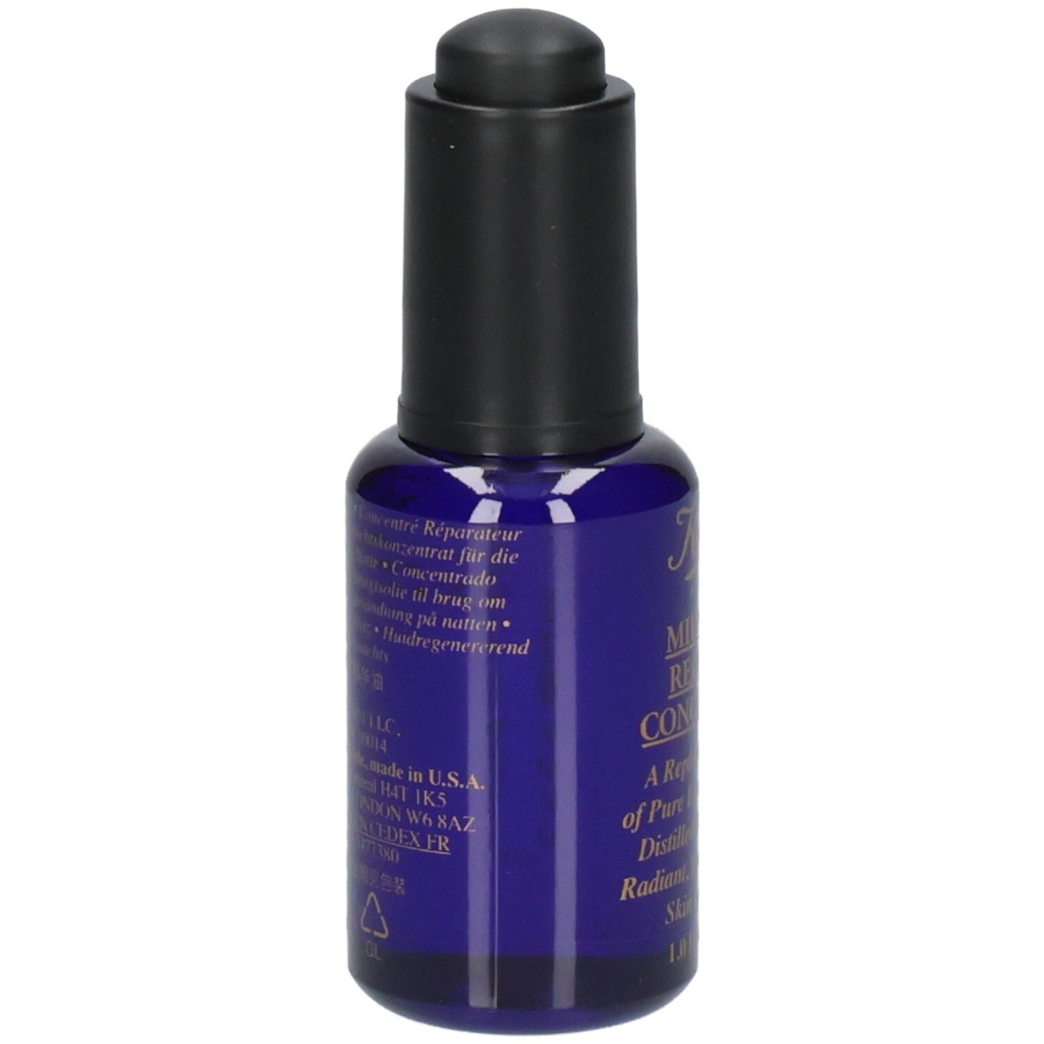 Kiehl's Midnight Recovery Concentrate : arrière du flacon en verre bleu avec étiquette et informations.